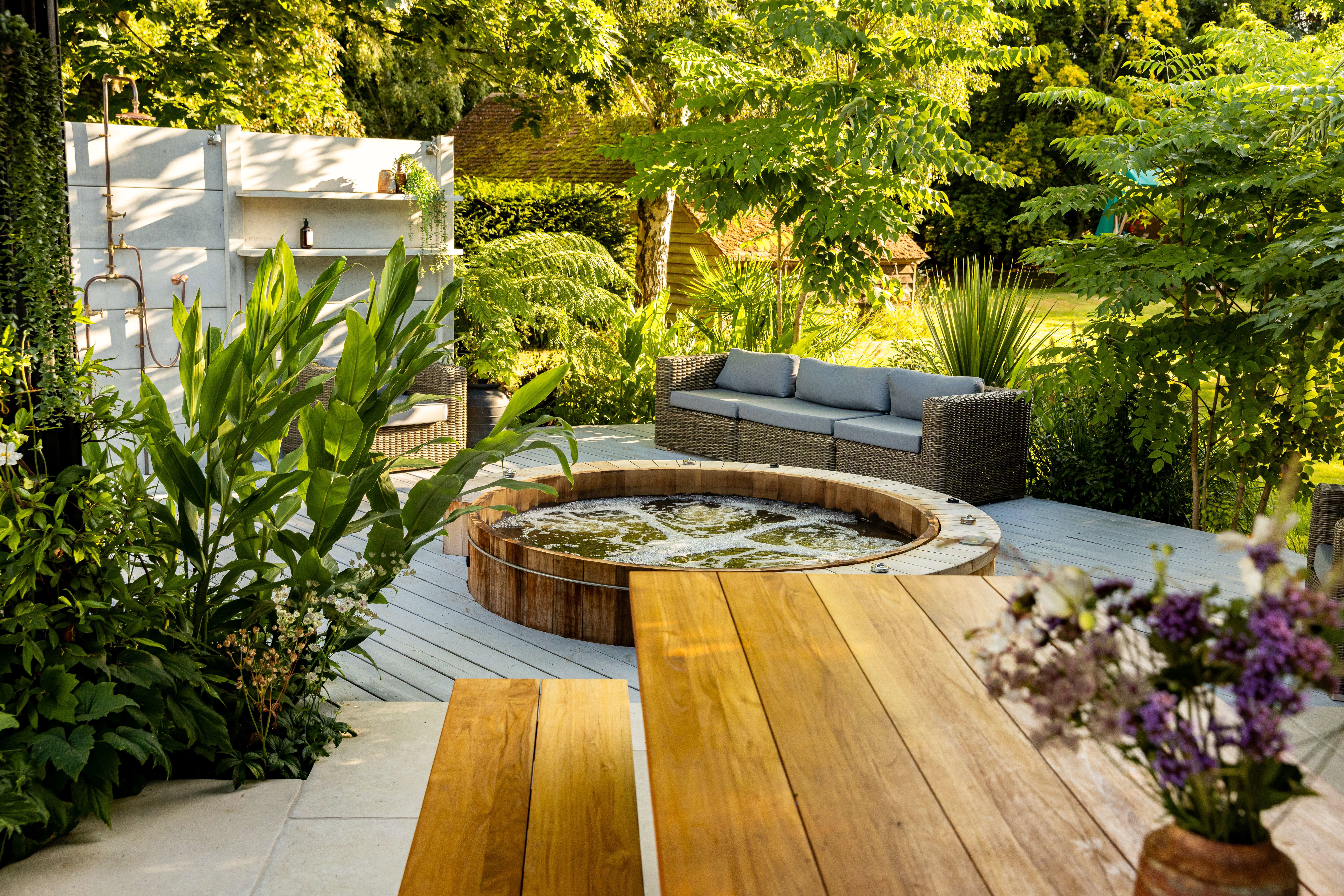 Spa garden with outdoor shower and jacuzzi