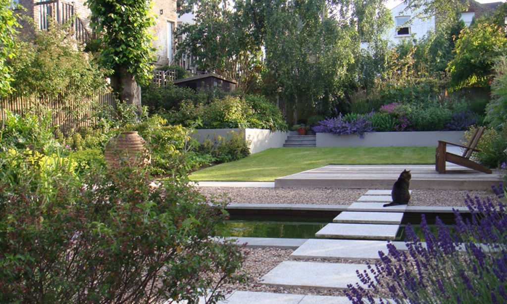 Stepping stones across pool to cedar deck