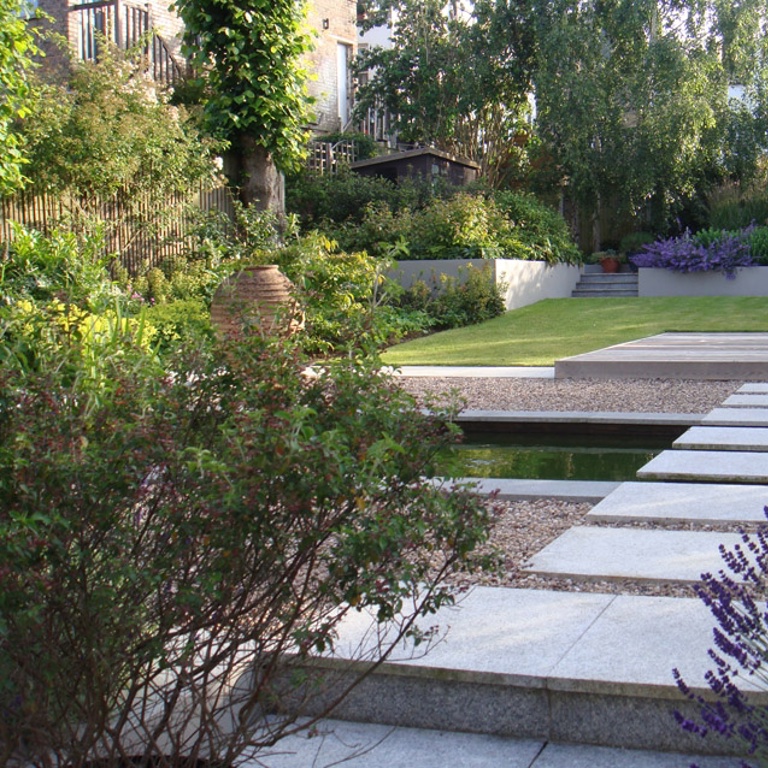 Stepping stones across pool to cedar deck