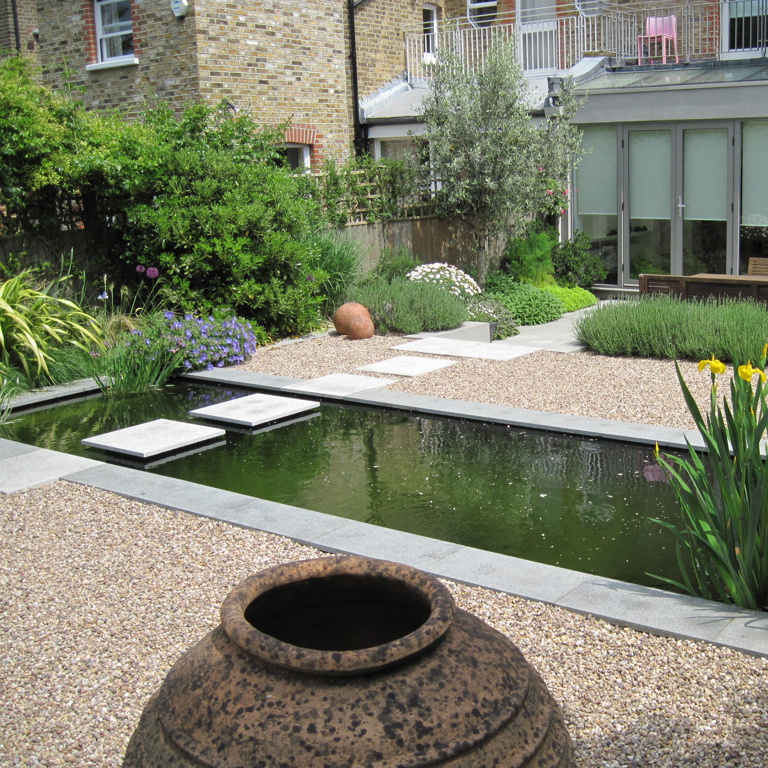 Formal pond with 'floating' stepping stones
