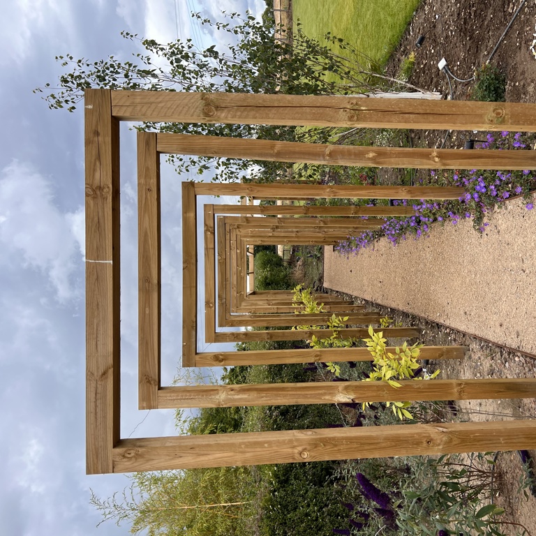 Archway leading to pergola