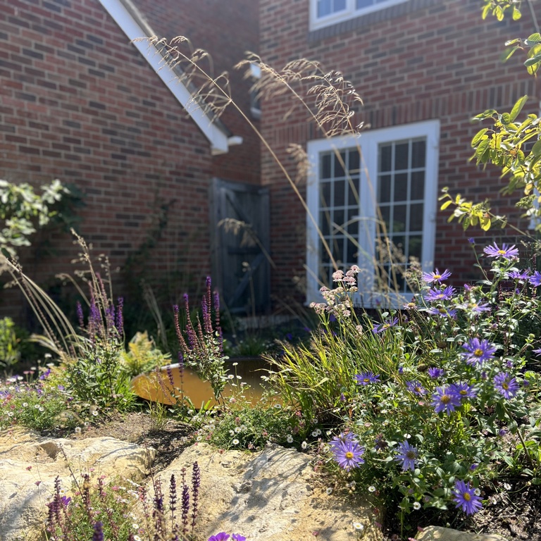 Boulders with planting and Corten water bowl