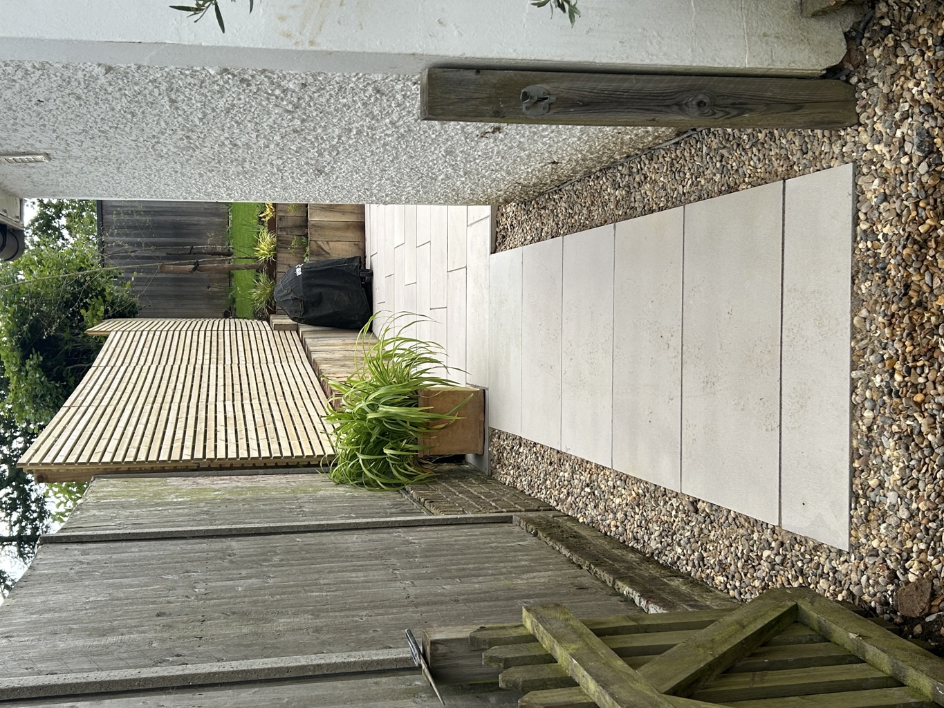 Contemporary slat fence and path