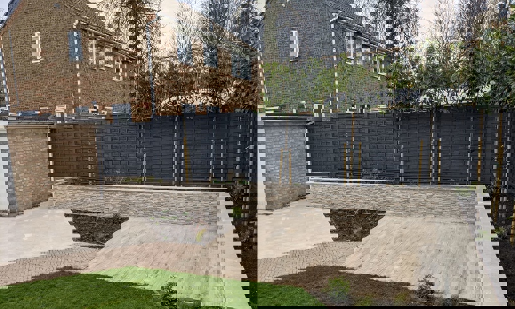 Wall with cladding