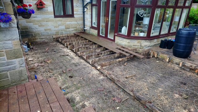 Old Decking being removed at back of house