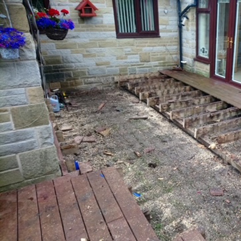 Old Decking being removed at back of house