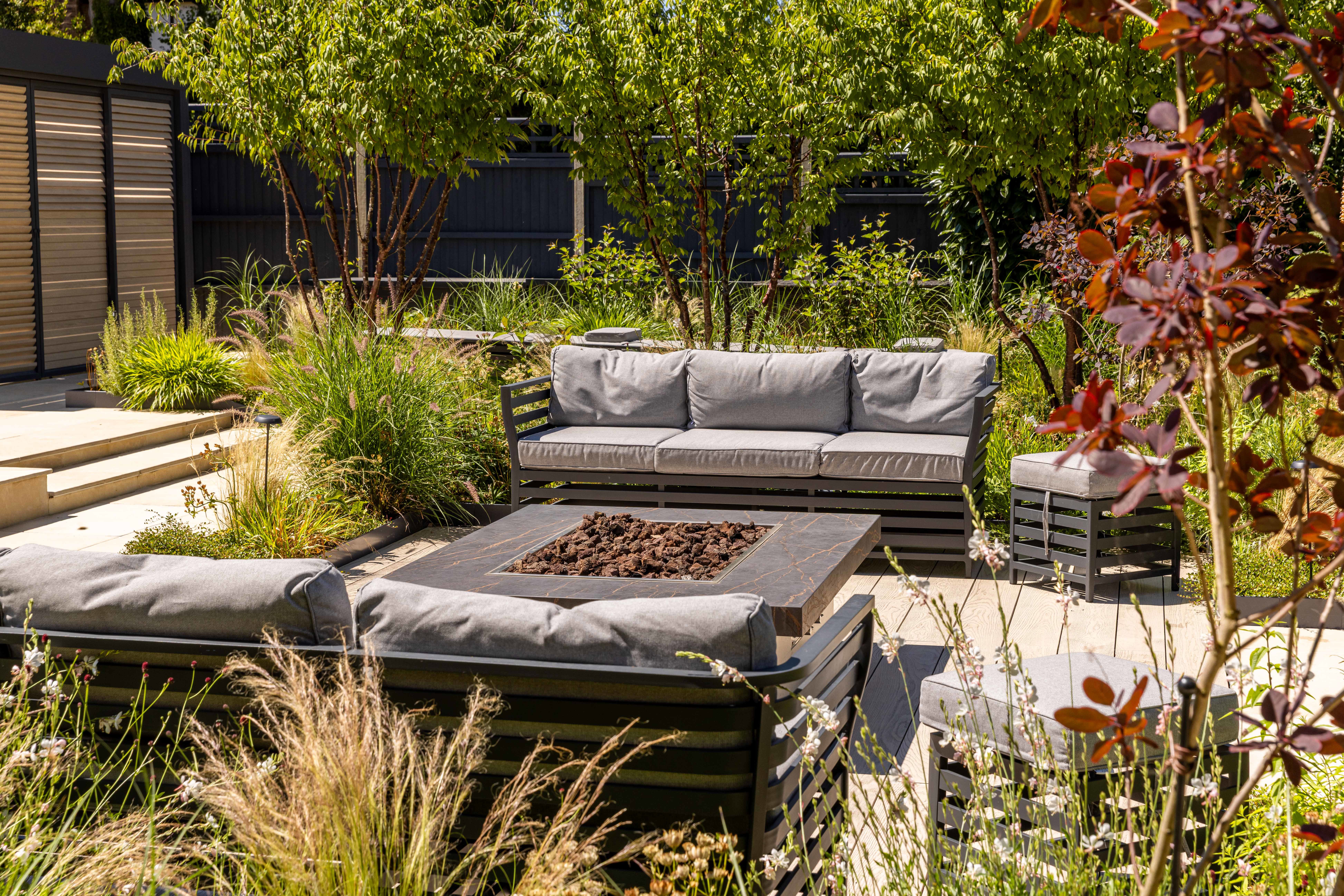 From day to night with bespoke firepit and seating area