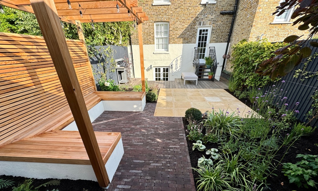 Clay paver path and cedar pergola