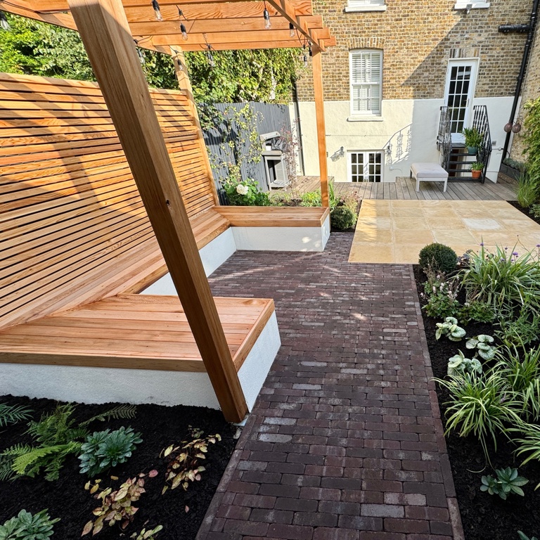Clay paver path and cedar pergola