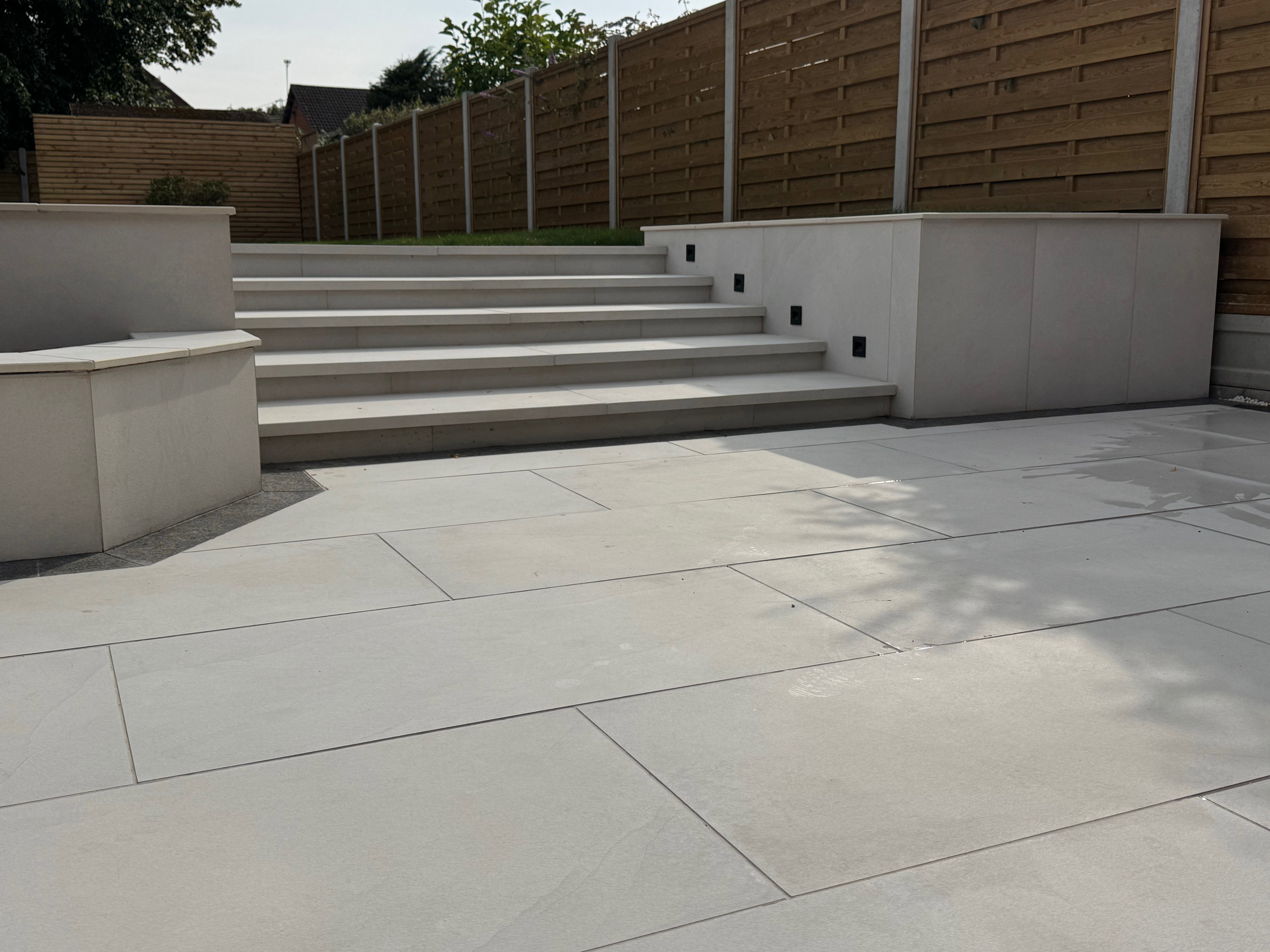 Patio and steps to upper level