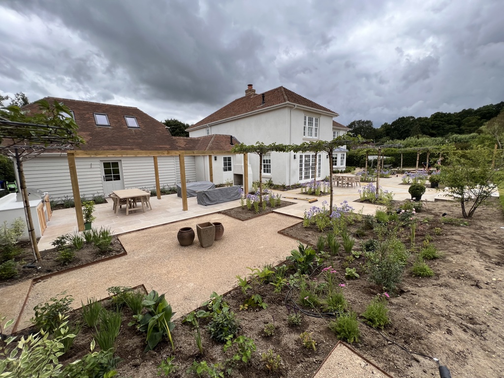 Gravel terraces creating breaks in levels and materials