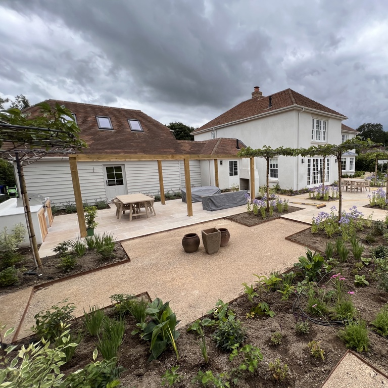 Gravel terraces creating breaks in levels and materials