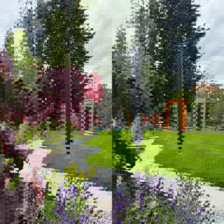 Flower bed and bespoke stepping stone pathway