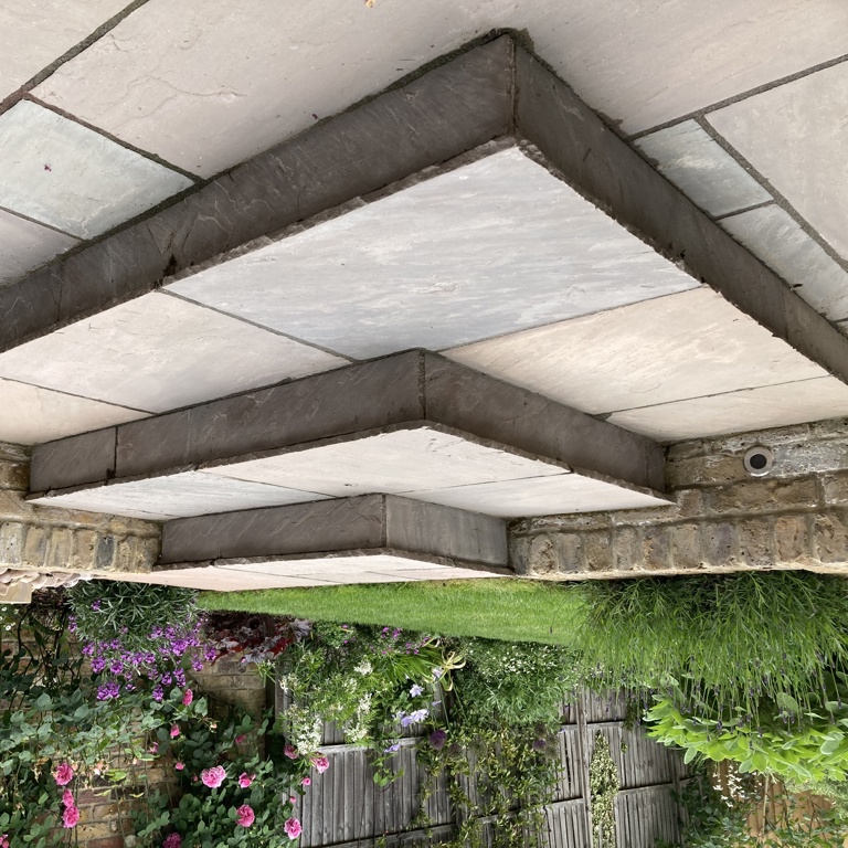 Sandstone steps up to lawn